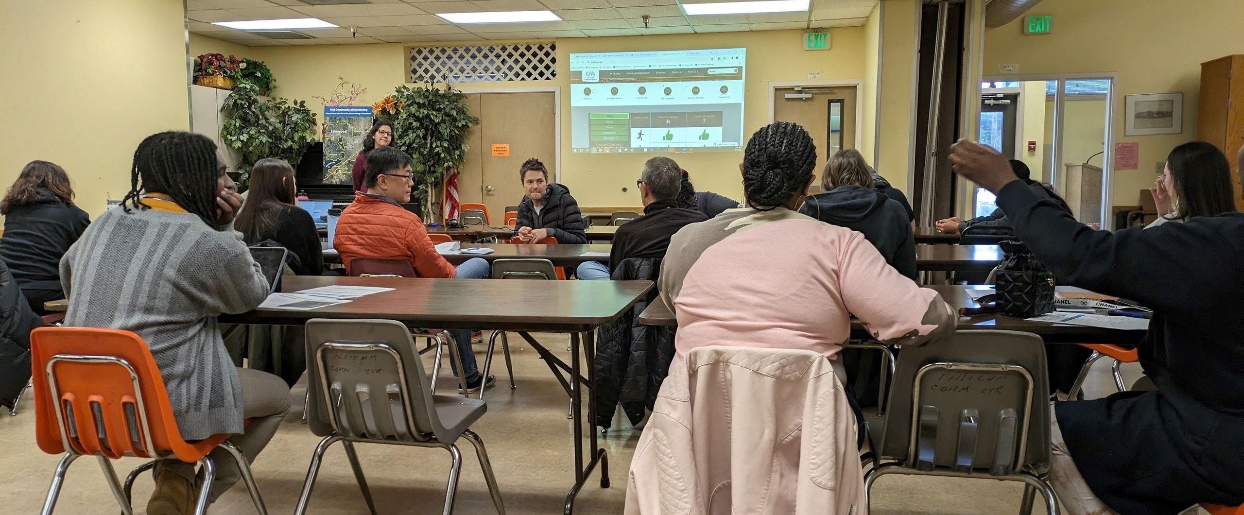 Agency staff discuss air quality concerns with community members