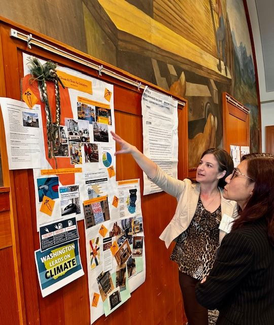 Agency staff creating posters at our second annual staff retreat
